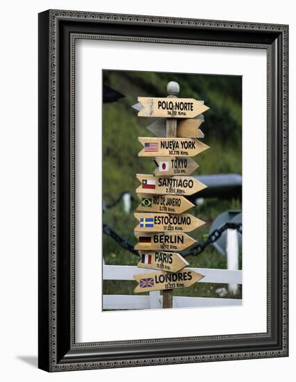 Mileage Sign Pointing Directions in Puerto Williams-Paul Souders-Framed Photographic Print