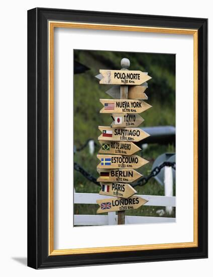 Mileage Sign Pointing Directions in Puerto Williams-Paul Souders-Framed Photographic Print