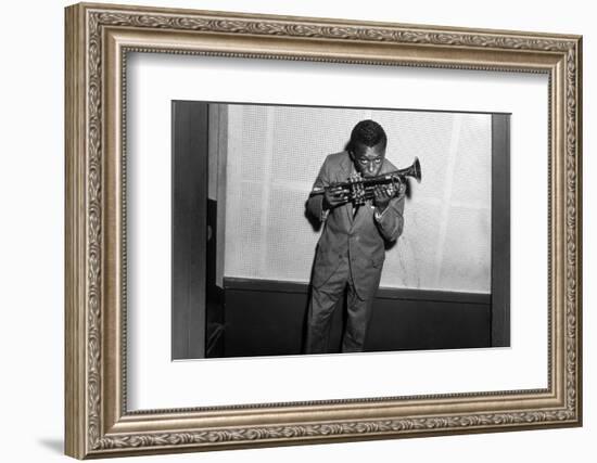 Miles Davis Kissing Trumpet-null-Framed Photo