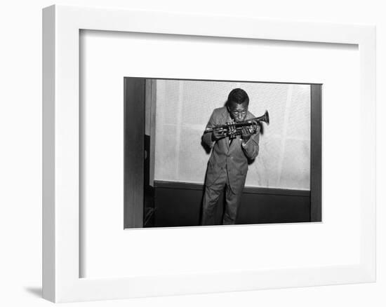 Miles Davis Kissing Trumpet-null-Framed Photo
