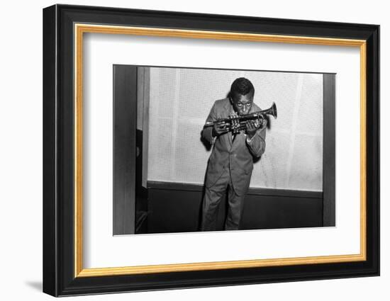 Miles Davis Kissing Trumpet-null-Framed Photo