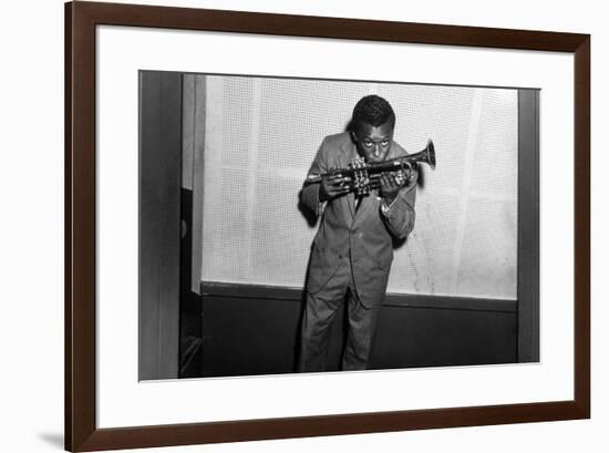 Miles Davis Kissing Trumpet-null-Framed Photo