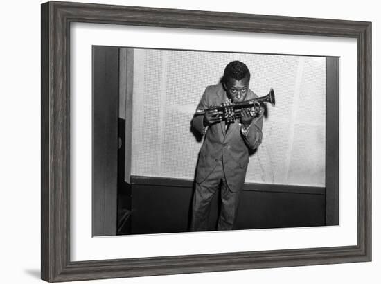 Miles Davis Kissing Trumpet-null-Framed Photo