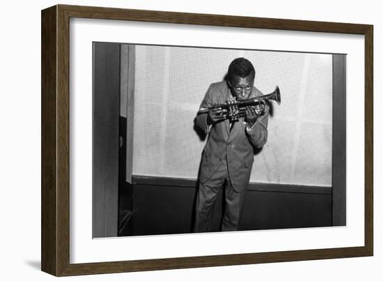 Miles Davis Kissing Trumpet-null-Framed Photo