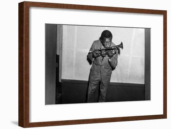 Miles Davis Kissing Trumpet-null-Framed Photo