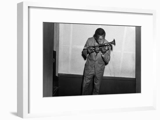 Miles Davis Kissing Trumpet-null-Framed Photo