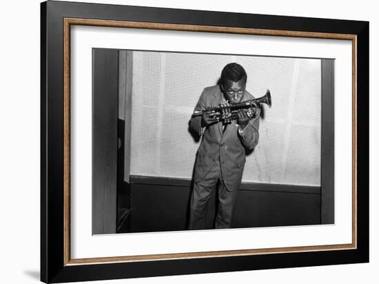 Miles Davis Kissing Trumpet-null-Framed Photo