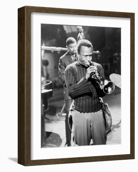 Miles Davis Performing in 1960-null-Framed Photo