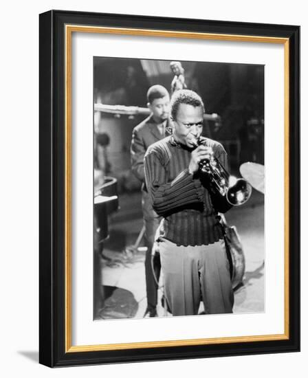 Miles Davis Performing in 1960-null-Framed Photo