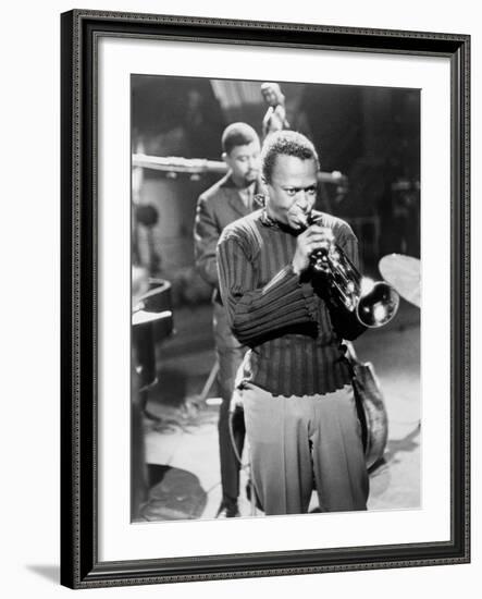 Miles Davis Performing in 1960-null-Framed Photo