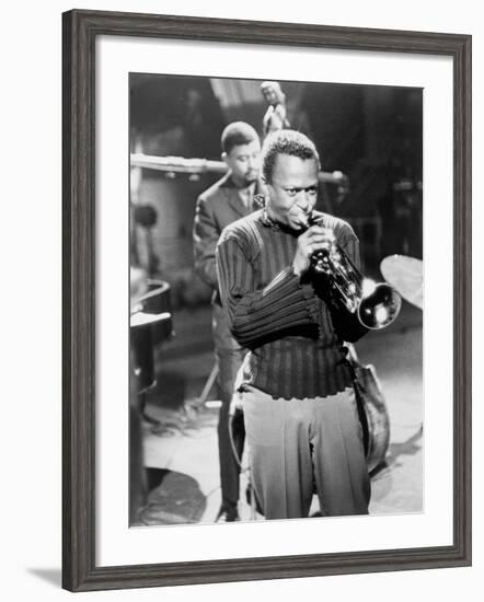 Miles Davis Performing in 1960-null-Framed Photo