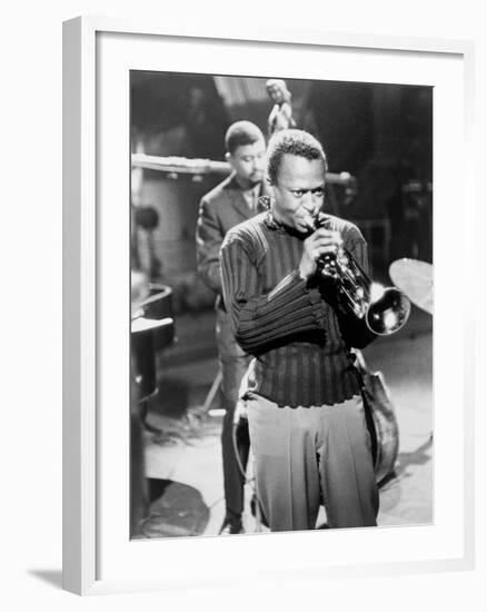 Miles Davis Performing in 1960-null-Framed Photo