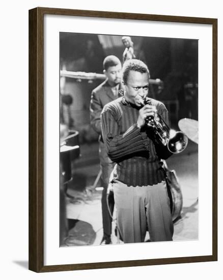 Miles Davis Performing in 1960-null-Framed Photo