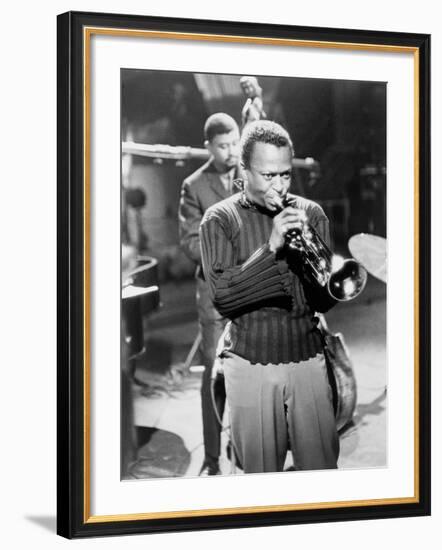 Miles Davis Performing in 1960-null-Framed Photo