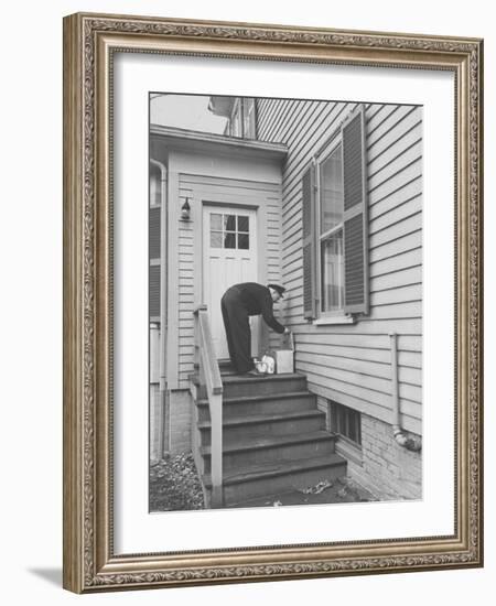 Milkman Delivering Milk to a Doorstep-Ralph Morse-Framed Photographic Print