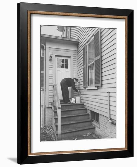 Milkman Delivering Milk to a Doorstep-Ralph Morse-Framed Photographic Print
