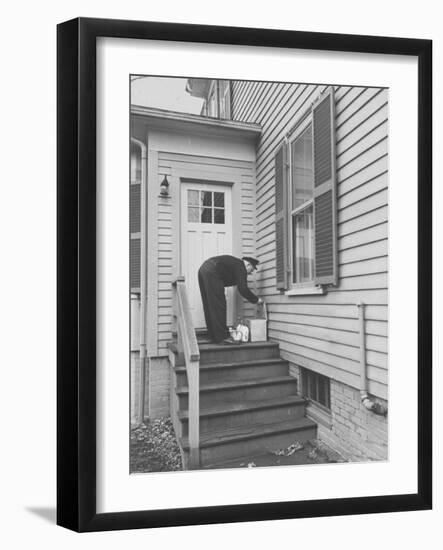 Milkman Delivering Milk to a Doorstep-Ralph Morse-Framed Photographic Print