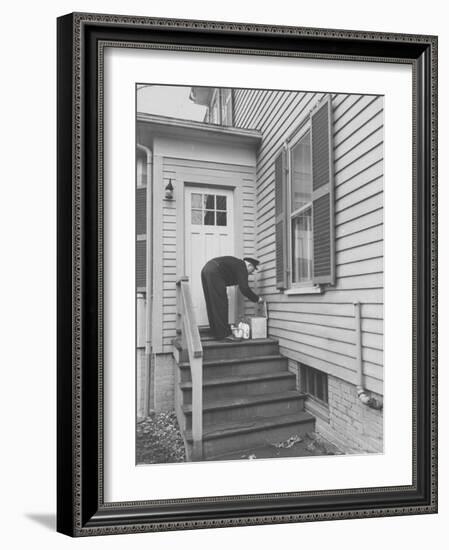 Milkman Delivering Milk to a Doorstep-Ralph Morse-Framed Photographic Print