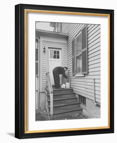 Milkman Delivering Milk to a Doorstep-Ralph Morse-Framed Photographic Print