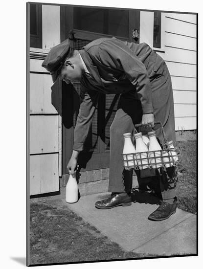 Milkman Leaving Milk Bottle on Doorstep-Philip Gendreau-Mounted Photographic Print