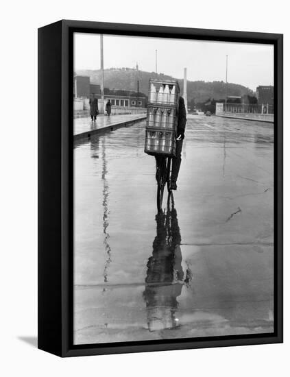 Milkman Riding on Slippery Road-null-Framed Premier Image Canvas