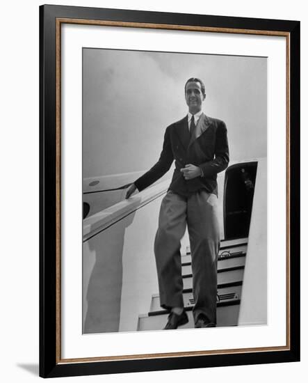 Millionaire Howard Hughes Deplaning at Airport-George Skadding-Framed Premium Photographic Print