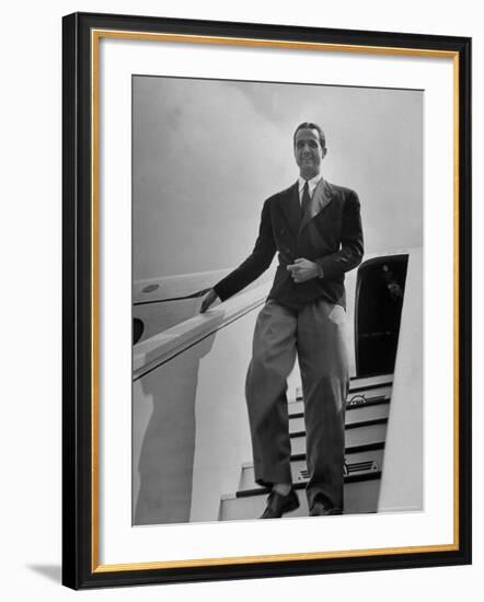 Millionaire Howard Hughes Deplaning at Airport-George Skadding-Framed Premium Photographic Print