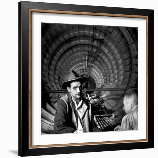 Millionaire Howard Hughes in Cockpit of Huge Sea Plane, Spruce Goose, Which He Designed and Built-J^ R^ Eyerman-Framed Premium Photographic Print