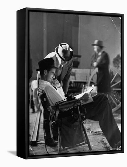 Millionaire Howard Hughes/Movie Studio Owner Studying Script on the Movie Set for "The Outlaw"-Bob Landry-Framed Premier Image Canvas