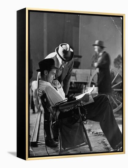 Millionaire Howard Hughes/Movie Studio Owner Studying Script on the Movie Set for "The Outlaw"-Bob Landry-Framed Premier Image Canvas