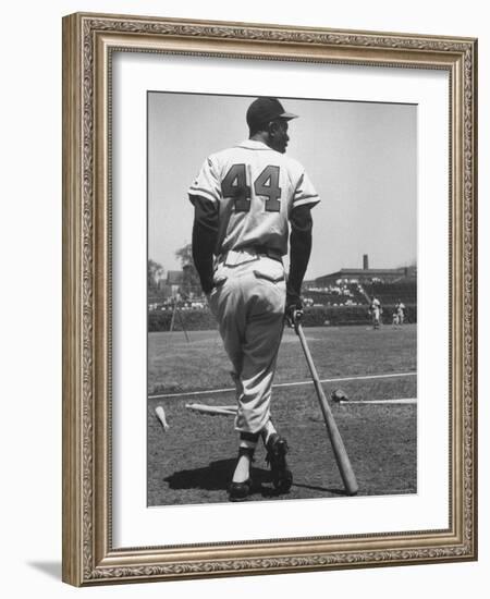 Milwaukee Braves Hank Aaron Leaning on Bat During Baseball Game-George Silk-Framed Premium Photographic Print