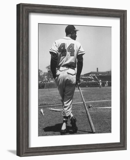 Milwaukee Braves Hank Aaron Leaning on Bat During Baseball Game-George Silk-Framed Premium Photographic Print