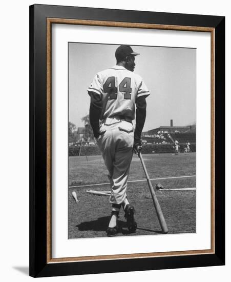 Milwaukee Braves Hank Aaron Leaning on Bat During Baseball Game-George Silk-Framed Premium Photographic Print