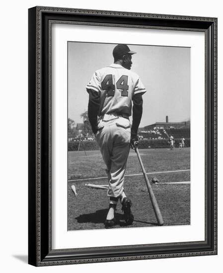 Milwaukee Braves Hank Aaron Leaning on Bat During Baseball Game-George Silk-Framed Premium Photographic Print