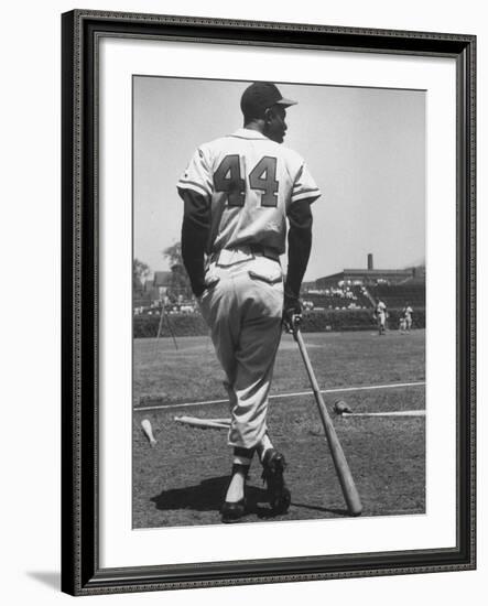 Milwaukee Braves Hank Aaron Leaning on Bat During Baseball Game-George Silk-Framed Premium Photographic Print