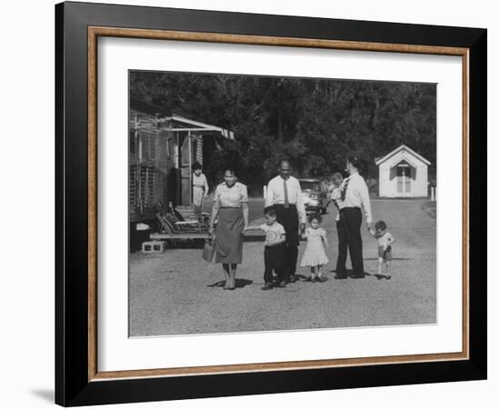 Miner Maurice Ruddick with Family and Friends Walking Near Segregated Camp Site-Carl Mydans-Framed Photographic Print