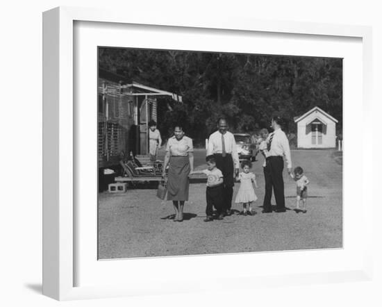 Miner Maurice Ruddick with Family and Friends Walking Near Segregated Camp Site-Carl Mydans-Framed Photographic Print