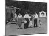 Miner Maurice Ruddick with Family and Friends Walking Near Segregated Camp Site-Carl Mydans-Mounted Photographic Print