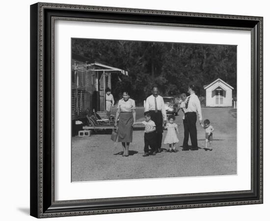 Miner Maurice Ruddick with Family and Friends Walking Near Segregated Camp Site-Carl Mydans-Framed Photographic Print