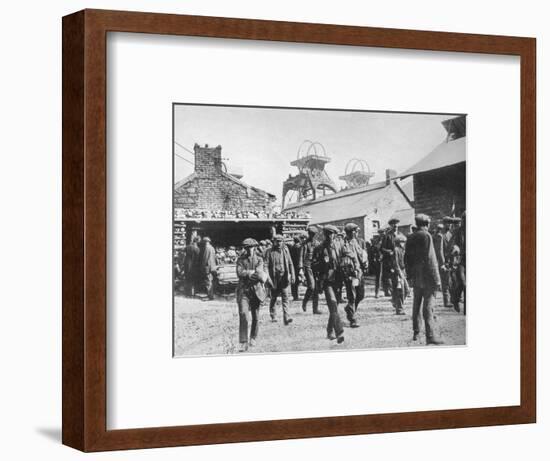 'Miners leaving the pithead after the expiration of their strike notices', 1915-Unknown-Framed Photographic Print