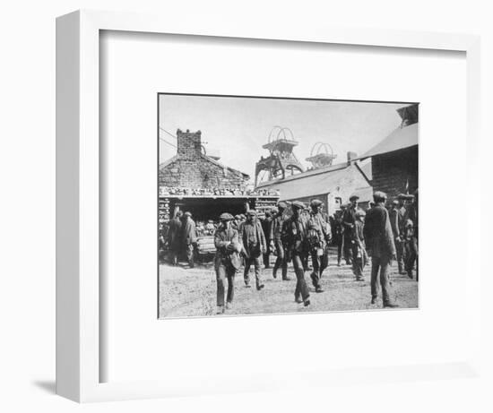 'Miners leaving the pithead after the expiration of their strike notices', 1915-Unknown-Framed Photographic Print