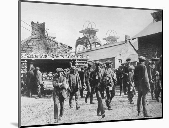 'Miners leaving the pithead after the expiration of their strike notices', 1915-Unknown-Mounted Photographic Print