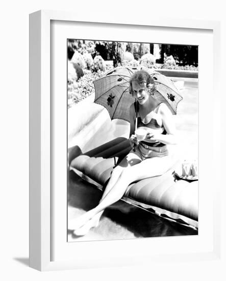 Minna Gombell, Sipping a Cup of Tea Poolside, 1931-null-Framed Photo