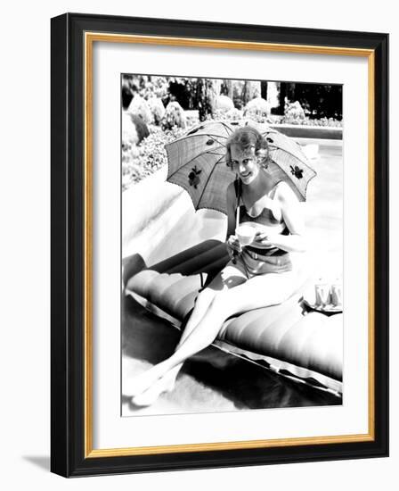 Minna Gombell, Sipping a Cup of Tea Poolside, 1931-null-Framed Photo