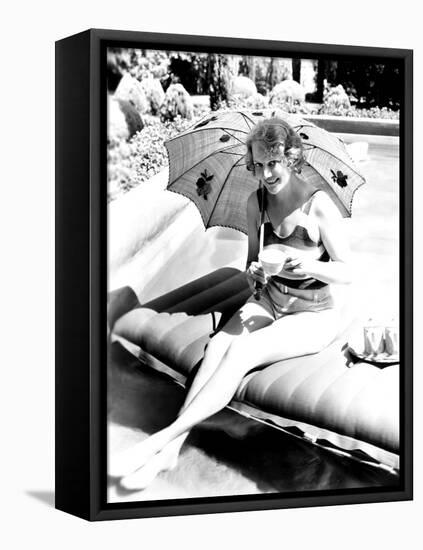 Minna Gombell, Sipping a Cup of Tea Poolside, 1931-null-Framed Stretched Canvas