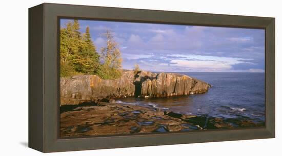 Minnesota, Lichen Covered Rocks and Stormy Sky over Lake Superior at Artist Point-John Barger-Framed Premier Image Canvas