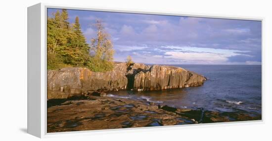 Minnesota, Lichen Covered Rocks and Stormy Sky over Lake Superior at Artist Point-John Barger-Framed Premier Image Canvas