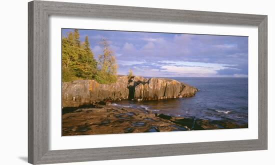 Minnesota, Lichen Covered Rocks and Stormy Sky over Lake Superior at Artist Point-John Barger-Framed Photographic Print