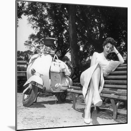 Miranda Martino Reading Seated on a Bench-null-Mounted Photographic Print