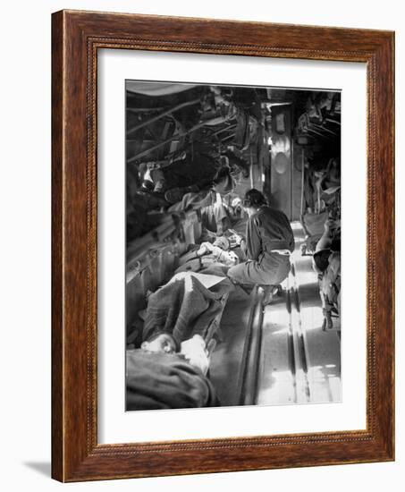 Miss Mary Smith of South Carolina Treating Patients During Flight to North-American Photographer-Framed Photographic Print